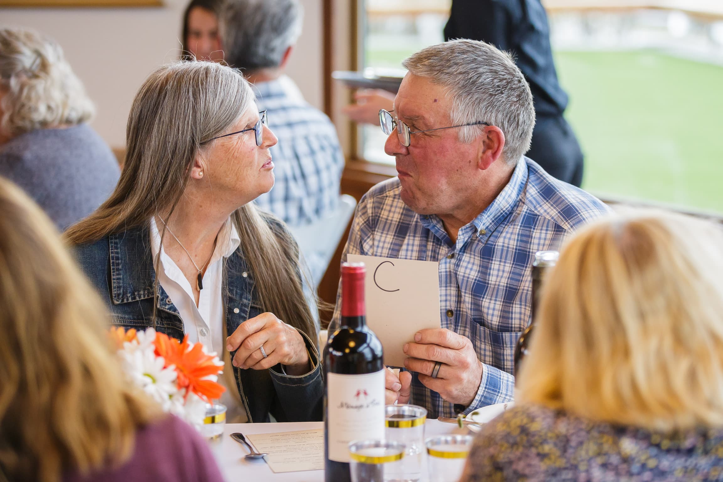 A couple in conversation at one of our retreat workshops.